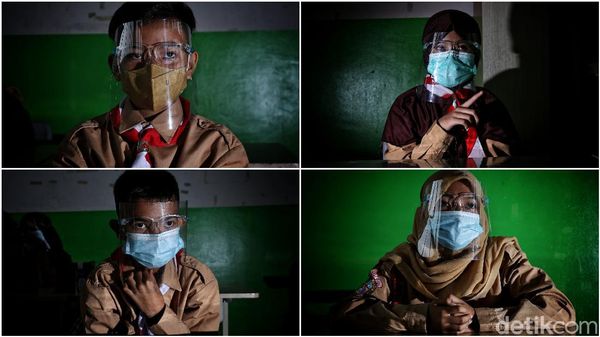 Potret Wajah-wajah Melepas Rindu Belajar di Sekolah