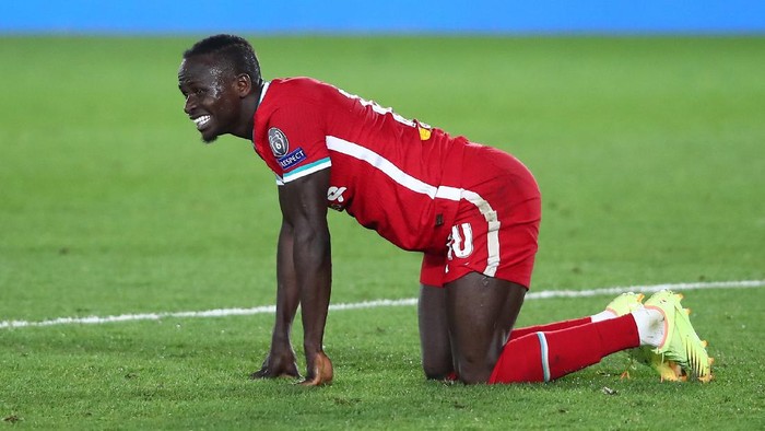 MADRID, SPAIN - APRIL 06: Sadio Mane of Liverpool reacts during the UEFA Champions League Quarter Final match between Real Madrid and Liverpool FC at Estadio Alfredo Di Stefano on April 06, 2021 in Madrid, Spain. Sporting stadiums around Spain remain under strict restrictions due to the Coronavirus Pandemic as Government social distancing laws prohibit fans inside venues resulting in games being played behind closed doors.  (Photo by Fran Santiago/Getty Images)
