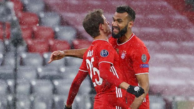 Bayern vs PSG Soccer Football - Champions League - Quarter Final First Leg - Bayern Munich v Paris St Germain - Allianz Arena, Munich, Germany - April 7, 2021 Bayern Munich's Thomas Muller celebrates scoring their second goal with Eric Maxim Choupo-Moting REUTERS/Kai Pfaffenbach
