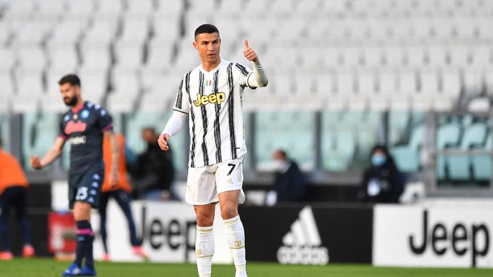 TURIN, ITALY - APRIL 07: Cristiano Ronaldo of Juventus celebrates after scoring their sides first goal during the Serie A match between Juventus and Napoli at Allianz Stadium on April 07, 2021 in Turin, Italy. Sporting stadiums around Italy remain under strict restrictions due to the Coronavirus Pandemic as Government social distancing laws prohibit fans inside venues resulting in games being played behind closed doors. (Photo by Valerio Pennicino/Getty Images)