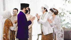 Foto Populer Sepekan: Bencana NTT - Jokowi di Pernikahan Atta-Aurel
