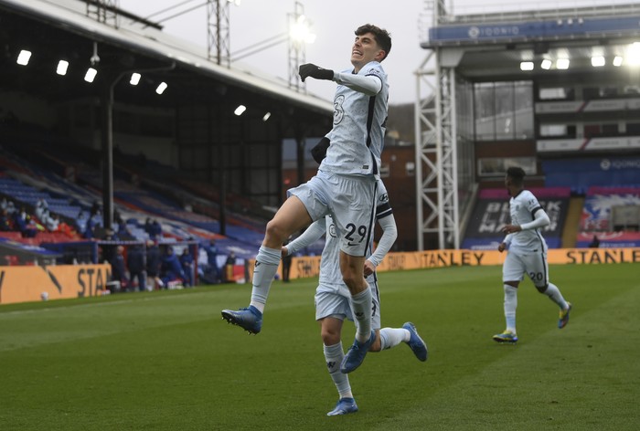 Chelseas Kai Havertz celebrates with teammates after scoring his sides opening goal during the English Premier League soccer match between Crystal Palace and Chelsea at Selhurst Park stadium in London, Saturday, April 10, 2021. (Mike Hewitt/Pool via AP)