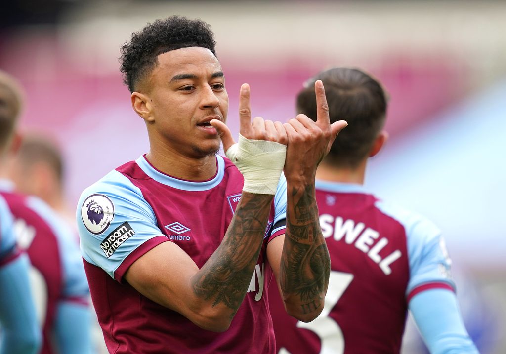LONDON, ENGLAND - APRIL 11: Jesse Lingard of West Ham United celebrates after scoring their team's first goal during the Premier League match between West Ham United and Leicester City at London Stadium on April 11, 2021 in London, England. Sporting stadiums around the UK remain under strict restrictions due to the Coronavirus Pandemic as Government social distancing laws prohibit fans inside venues resulting in games being played behind closed doors. (Photo by John Walton - Pool/Getty Images)