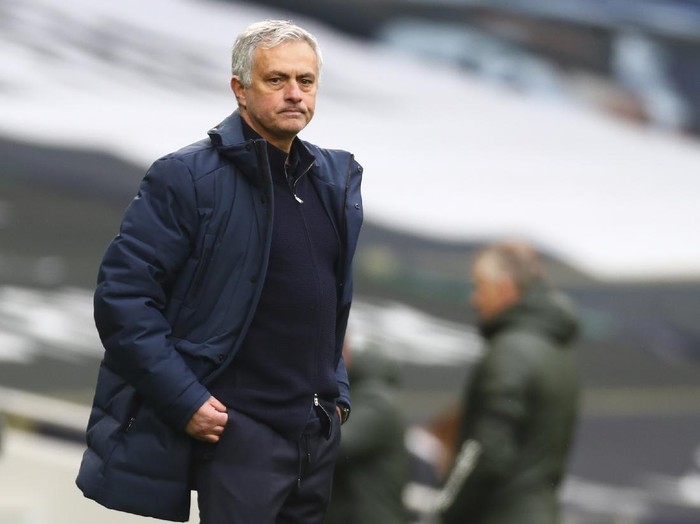 Tottenham's manager Jose Mourinho reacts during the English Premier League soccer match between Tottenham Hotspur and Manchester United at the Tottenham Hotspur Stadium in London, Sunday, April 11, 2021. (Clive Rose/Pool via AP)