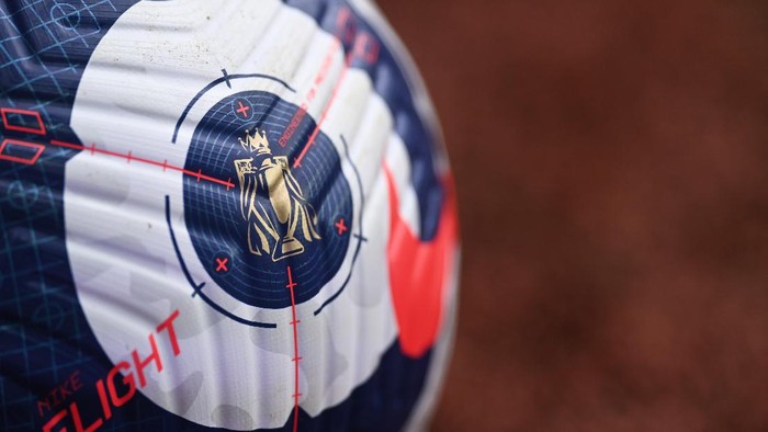 BIRMINGHAM, ENGLAND - FEBRUARY 21: A detailed view of the Premier League trophy on the blue and white Nike Flight Premier League ball prior to the Premier League match between Aston Villa and Leicester City at Villa Park on February 21, 2021 in Birmingham, England. Sporting stadiums around the UK remain under strict restrictions due to the Coronavirus Pandemic as Government social distancing laws prohibit fans inside venues resulting in games being played behind closed doors. (Photo by Michael Regan/Getty Images)