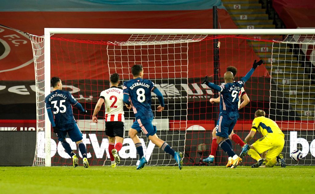 SHEFFIELD, ENGLAND - APRIL 11: Gabriel Martinelli of Arsenal celebrates with Willian and Pablo Mari after scoring their side's second goal during the Premier League match between Sheffield United and Arsenal at Bramall Lane on April 11, 2021 in Sheffield, England. Sporting stadiums around the UK remain under strict restrictions due to the Coronavirus Pandemic as Government social distancing laws prohibit fans inside venues resulting in games being played behind closed doors. (Photo by Tim Keeton - Pool/Getty Images)