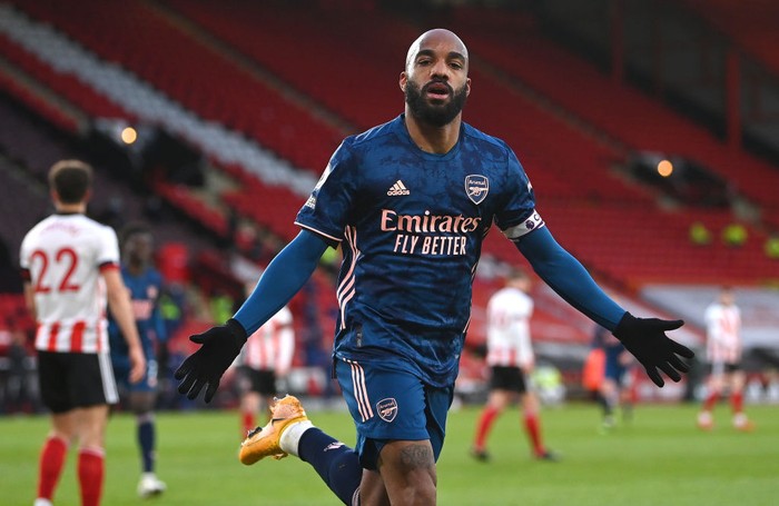SHEFFIELD, ENGLAND - APRIL 11: Alexandre Lacazette of Arsenal celebrates after scoring their sides first goal during the Premier League match between Sheffield United and Arsenal at Bramall Lane on April 11, 2021 in Sheffield, England. Sporting stadiums around the UK remain under strict restrictions due to the Coronavirus Pandemic as Government social distancing laws prohibit fans inside venues resulting in games being played behind closed doors. (Photo by Laurence Griffiths/Getty Images)