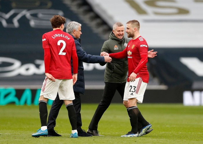 LONDON, ENGLAND - APRIL 11: Jose Mourinho, Manager of Tottenham Hotspur interacts with Luke Shaw of Manchester United after the Premier League match between Tottenham Hotspur and Manchester United at Tottenham Hotspur Stadium on April 11, 2021 in London, England. Sporting stadiums around the UK remain under strict restrictions due to the Coronavirus Pandemic as Government social distancing laws prohibit fans inside venues resulting in games being played behind closed doors. (Photo by Matthew Childs - Pool/Getty Images)