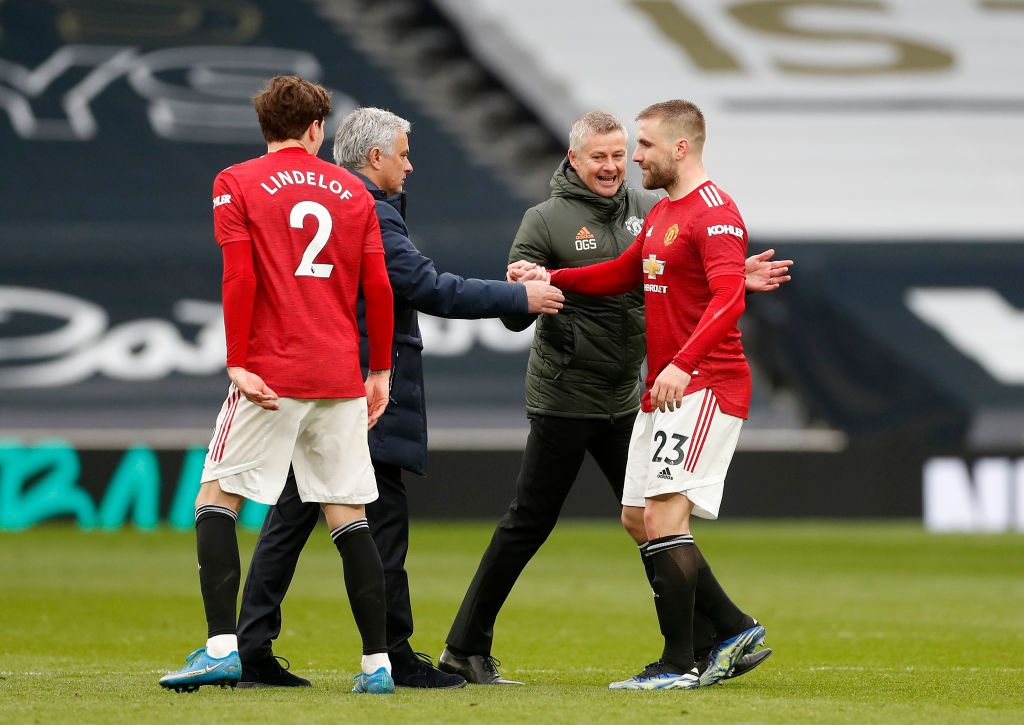 LONDON, ENGLAND - APRIL 11: Jose Mourinho, Manager of Tottenham Hotspur interacts with Luke Shaw of Manchester United after the Premier League match between Tottenham Hotspur and Manchester United at Tottenham Hotspur Stadium on April 11, 2021 in London, England. Sporting stadiums around the UK remain under strict restrictions due to the Coronavirus Pandemic as Government social distancing laws prohibit fans inside venues resulting in games being played behind closed doors. (Photo by Matthew Childs - Pool/Getty Images)