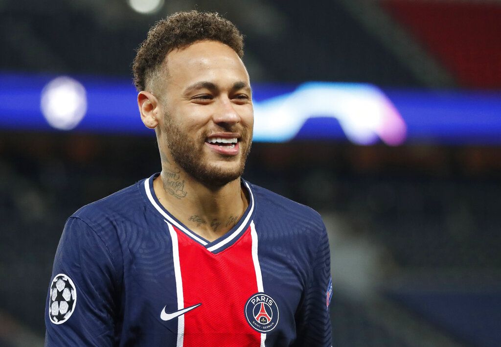 PSG's Neymar smiles during the Champions League, second leg, quarterfinal soccer match between Paris Saint Germain and Bayern Munich at the Parc des Princes stadium, in Paris, France, Tuesday, April 13, 2021. (AP Photo/Francois Mori)