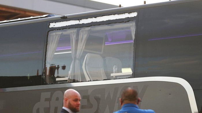 A view of the Real Madrid team bus showing damage to a window that happened before the Champions League quarterfinal second leg soccer against Liverpool match at Anfield, Liverpool, England, Wednesday April 14, 2021. (Peter Byrne/PA via AP)