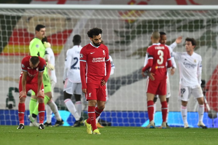 LIVERPOOL, ENGLAND - APRIL 14: Mohamed Salah of Liverpool looks dejected following the UEFA Champions League Quarter Final Second Leg match between Liverpool FC and Real Madrid at Anfield on April 14, 2021 in Liverpool, England. Sporting stadiums around the UK remain under strict restrictions due to the Coronavirus Pandemic as Government social distancing laws prohibit fans inside venues resulting in games being played behind closed doors. (Photo by Michael Regan/Getty Images)