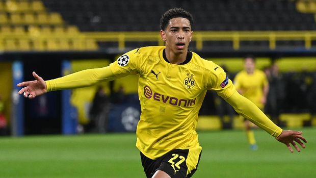 Soccer Football - Champions League - Quarter Final Second Leg - Borussia Dortmund v Manchester City - Signal Iduna Park, Dortmund, Germany - April 14, 2021 Borussia Dortmund's Jude Bellingham celebrates scoring their first goal Pool via REUTERS/Ina Fassbender