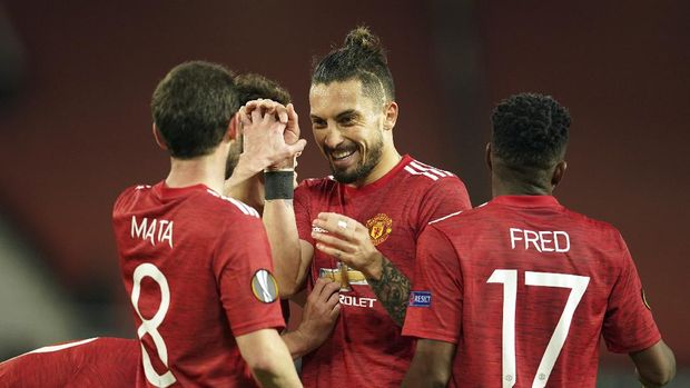 Manchester players celebrate after the Europa League, quarterfinal, second leg soccer match between Manchester United and Granada at the Old Trafford stadium, in Manchester, Thursday, April 15, 2021. (AP Photo/Dave Thompson)