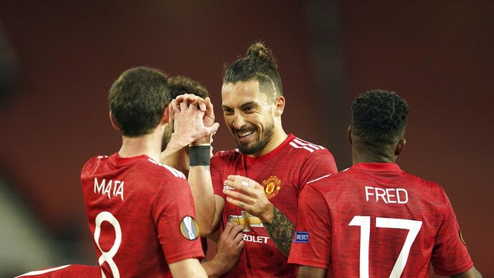 Manchester players celebrate after the Europa League, quarterfinal, second leg soccer match between Manchester United and Granada at the Old Trafford stadium, in Manchester, Thursday, April 15, 2021. (AP Photo/Dave Thompson)
