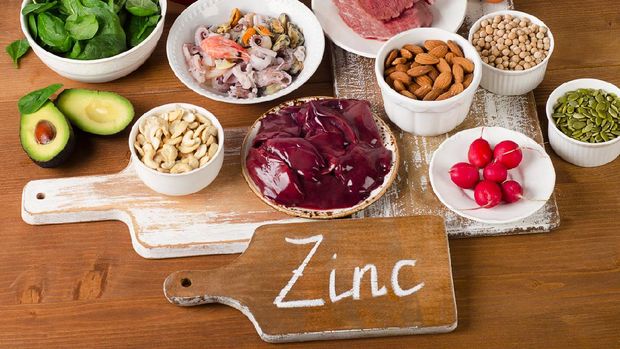 Foods with Zinc mineral on a wooden table. Top view