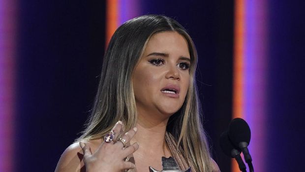 Maren Morris accepts the award for female artist of the year at the 56th annual Academy of Country Music Awards on Sunday, April 18, 2021, at the Grand Ole Opry in Nashville, Tenn. (AP Photo/Mark Humphrey)
