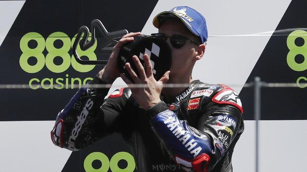 MotoGP - Portuguese Grand Prix - Algarve International Circuit, Portimao, Portugal - April 18, 2021 Monster Energy Yamaha MotoGP's Fabio Quartararo celebrates winning the race REUTERS/Pedro Nunes