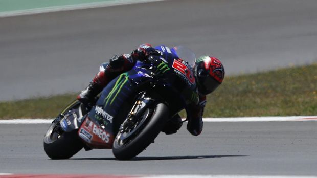 MotoGP Portugal 2021 MotoGP - Portuguese Grand Prix - Algarve International Circuit, Portimao, Portugal - April 18, 2021 Monster Energy Yamaha MotoGP's Fabio Quartararo during the race REUTERS/Pedro Nunes