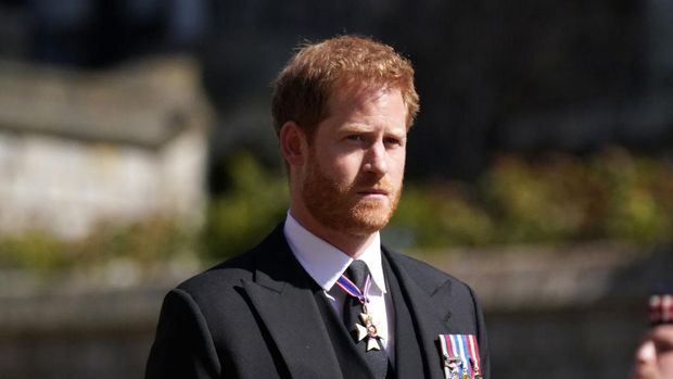 WINDSOR, ENGLAND - APRIL 17: Prince Harry arrives for the funeral of Prince Philip, Duke of Edinburgh at St George's Chapel at Windsor Castle on April 17, 2021 in Windsor, England. Prince Philip of Greece and Denmark was born 10 June 1921, in Greece. He served in the British Royal Navy and fought in WWII. He married the then Princess Elizabeth on 20 November 1947 and was created Duke of Edinburgh, Earl of Merioneth, and Baron Greenwich by King VI. He served as Prince Consort to Queen Elizabeth II until his death on April 9 2021, months short of his 100th birthday. His funeral takes place today at Windsor Castle with only 30 guests invited due to Coronavirus pandemic restrictions. (Photo by Victoria Jones - WPA Pool/Getty Images)