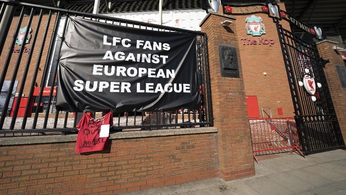 Banners are seen outside Liverpools Anfield Stadium protesting the formation of the European Super League, Liverpool, England, Monday, April 19, 2021. Players at the 12 clubs setting up their own Super League could be banned from this years European Championship and next years World Cup, UEFA President Aleksander Ceferin said Monday.