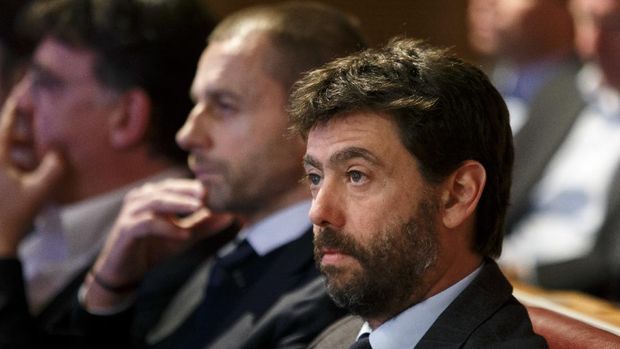 FILE - In this Monday, Dec. 17, 2018 filer, UEFA president Aleksander Ceferin, center, and the Chairman of the European Club Association, ECA, Italy's Andrea Agnelli, right, attend the drawing of the matches for the Champions League 2018/19 Round of 16, at the UEFA headquarters in Nyon, Switzerland. The 12 European clubs planning to start a breakaway Super League have told the leaders of FIFA and UEFA that they have begun legal action aimed at fending off threats to block the competition. A letter has been sent by the group of English, Spanish and Italian clubs to FIFA President Gianni Infantino and UEFA counterpart Aleksander Ceferin saying the Super League has already been underwritten by a grant of $5.5 billion from a financial institution. (Salvatore Di Nolfi/Keystone via AP)