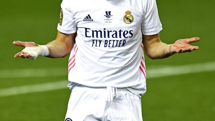 FILE - In this Thursday, Jan. 14, 2021 file photo Real Madrids Karim Benzema gestures during Spanish Super Cup semi final soccer match between Real Madrid and Athletic Bilbao at La Rosaleda stadium in Malaga, Spain. UEFA President Aleksander Ceferin says players at the 12 clubs setting up their own Super League could be banned from this years European Championship and next years World Cup. (AP Photo/Jose Breton, File)