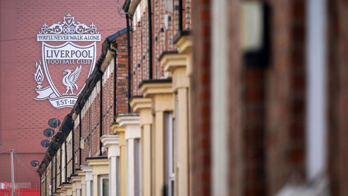 LIVERPOOL, UNITED KINGDOM - APRIL 20: Terraced homes surround Anfield stadium, the home of Liverpool Football Club, after the club disclosed its intentions to join the European Super League, on April 20, 2021 in Liverpool, United Kingdom. Six English premier league teams have announced they are part of plans for a breakaway European Super League. Arsenal, Manchester United, Manchester City, Liverpool, Chelsea and Tottenham Hotspur will join 12 other European teams in a closed league similar to that of the NFL American Football League. In a statement released last night, the new competition 