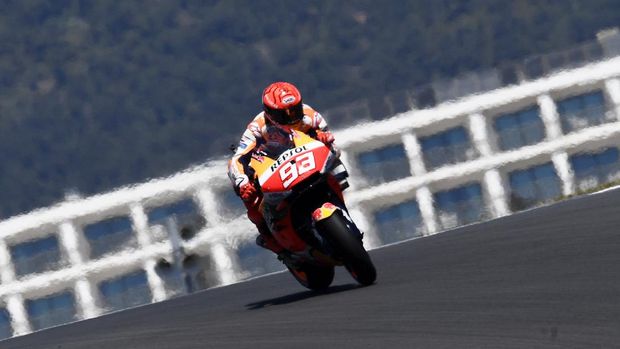 MotoGP rider Marc Marquez of Spain steers his motorcycle during the Portuguese Motorcycle Grand Prix at the Algarve International circuit near Portimao, Portugal, Sunday, April 18, 2021. (AP Photo/Jose Breton)