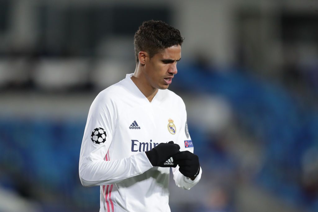 MADRID, SPAIN - MARCH 16: Raphael Varane of Real Madrid CF reacts during the UEFA Champions League Round of 16 match between Real Madrid and Atalanta at Alfredo Di Stefano stadium on March 16, 2021 in Madrid, Spain. Sporting stadiums around Spain remain under strict restrictions due to the Coronavirus Pandemic as Government social distancing laws prohibit fans inside venues resulting in games being played behind closed doors. (Photo by Gonzalo Arroyo Moreno/Getty Images)