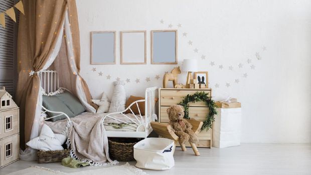 Stylish scandinavian  baby room with crib, dresser, wooden toys and lamp. zero waste. eco-friendly materials