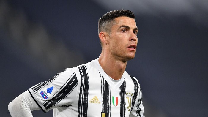 TURIN, ITALY - APRIL 21:  Cristiano Ronaldo of Juventus looks on during the Serie A match between Juventus  and Parma Calcio at Allianz Stadium on April 21, 2021 in Turin, Italy.  (Photo by Valerio Pennicino/Getty Images )