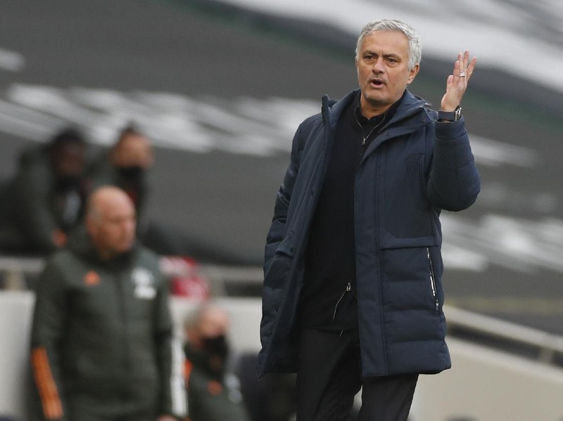 Tottenham's manager Jose Mourinho reacts during the English Premier League soccer match between Tottenham Hotspur and Manchester United at the Tottenham Hotspur Stadium in London, Sunday, April 11, 2021. (Matthew Childs/Pool via AP)