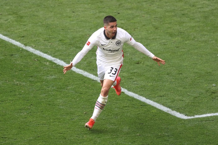 Wissam Ben Yedder, Andre Silva DORTMUND, GERMANY - APRIL 03: Andre Silva of Eintracht Frankfurt celebrates after scoring their side's second goal as during the Bundesliga match between Borussia Dortmund and Eintracht Frankfurt at Signal Iduna Park on April 03, 2021 in Dortmund, Germany. Sporting stadiums around Germany remain under strict restrictions due to the Coronavirus Pandemic as Government social distancing laws prohibit fans inside venues resulting in games being played behind closed doors. (Photo by Lars Baron/Getty Images)