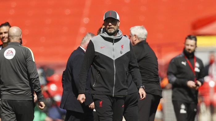 Liverpools manager Jurgen Klopp stands during the English Premier League soccer match between Liverpool and Newcastle United at Anfield stadium in Liverpool, England, Saturday, April 24, 2021. (Clive Brunskill, Pool via AP)
