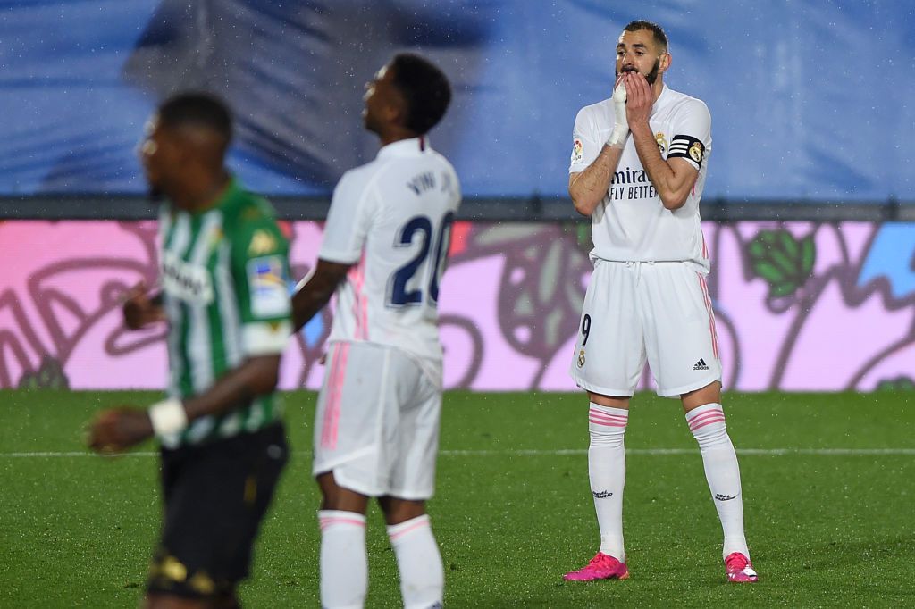 MADRID, SPAIN - APRIL 24: Karim Benzema of Real Madrid  reacts after a missed chance during the La Liga Santander match between Real Madrid and Real Betis at Estadio Santiago Bernabeu on April 24, 2021 in Madrid, Spain. Sporting stadiums around Spain remain under strict restrictions due to the Coronavirus Pandemic as Government social distancing laws prohibit fans inside venues resulting in games being played behind closed doors. (Photo by Denis Doyle/Getty Images)