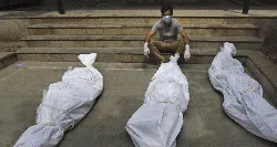 Foto Populer Sepekan: Tsunami Corona di India-Hilangnya KRI Nanggala