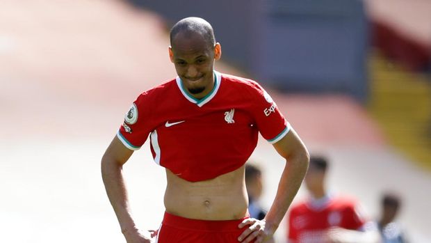 Soccer Football - Premier League - Liverpool v Newcastle United - Anfield, Liverpool, Britain - April 24, 2021 Liverpool's Fabinho looks dejected after the match Pool via REUTERS/David Klein EDITORIAL USE ONLY. No use with unauthorized audio, video, data, fixture lists, club/league logos or 'live' services. Online in-match use limited to 75 images, no video emulation. No use in betting, games or single club /league/player publications.  Please contact your account representative for further details.