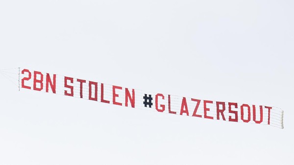 LEEDS, ENGLAND - APRIL 25: A Plane with a banner that reads 