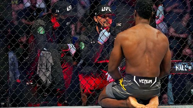 Apr 24, 2021; Jacksonville, Florida, USA; Uriah Hall (Red Gloves) reacts after Chris Weidman (Blue Gloves) broke his leg on the first kick of their fight during UFC 261 at VyStar Veterans Memorial Arena. Mandatory Credit: Jasen Vinlove-USA TODAY Sports