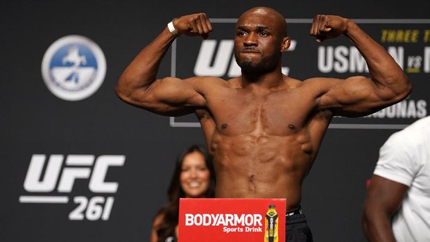 UFC 261 Apr 23, 2021; Jacksonville, Florida, USA; Kamaru Usman flexes during weigh-ins for UFC 261 at VyStar Veterans Memorial Arena. Mandatory Credit: Jasen Vinlove-USA TODAY Sports