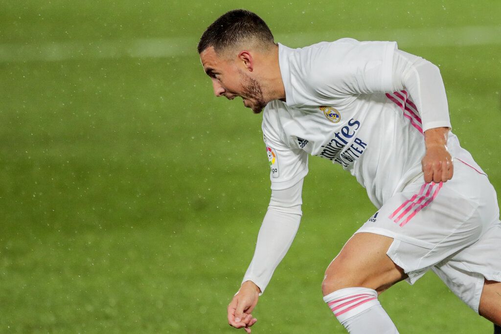 Real Madrid's Eden Hazard in action during the Spanish La Liga soccer match between Real Madrid and Betis at the Alfredo di Stefano stadium in Madrid, Spain, Saturday, April 24, 2021. (AP Photo/Bernat Armangue)