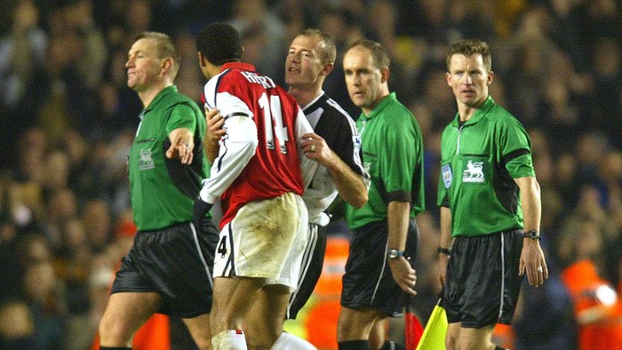 18 Dec 2001:  Thierry Henry of Arsenal is held back by Alan Shearer of Newcastle as he argues with referee Graham Poll at the end of the FA Barclaycard Premiership match between Arsenal and Newcastle United at Highbury, London. DIGITAL IMAGE  Mandatory Credit: Phil Cole/ALLSPORT
