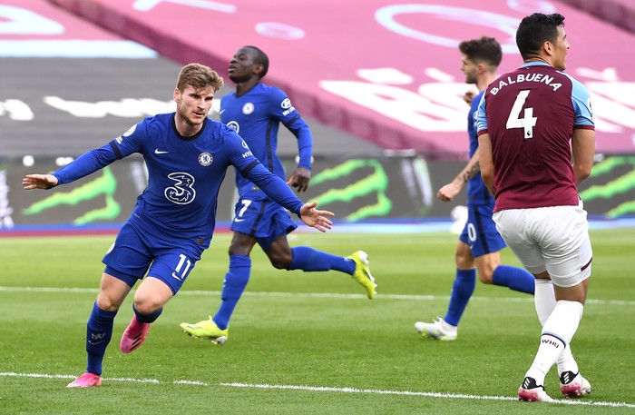 LONDON, ENGLAND - APRIL 24: Timo Werner of Chelsea celebrates after scoring their sides first goal  during the Premier League match between West Ham United and Chelsea at London Stadium on April 24, 2021 in London, England. Sporting stadiums around the UK remain under strict restrictions due to the Coronavirus Pandemic as Government social distancing laws prohibit fans inside venues resulting in games being played behind closed doors. (Photo by Andy Rain - Pool/Getty Images)
