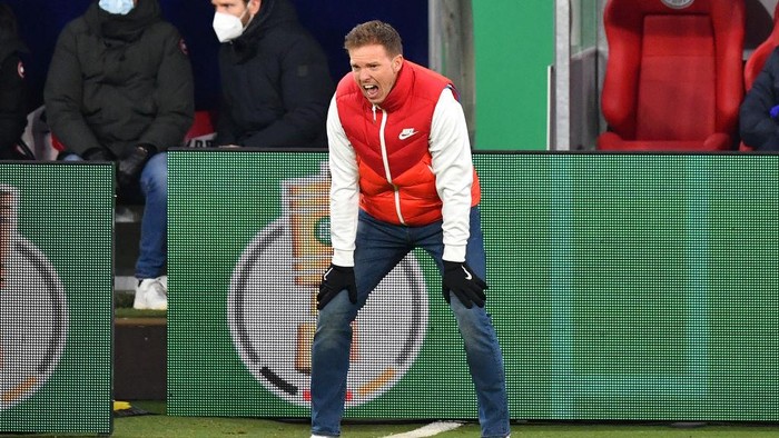 LEIPZIG, GERMANY - MARCH 03: Julian Nagelsmann, Head Coach of RB Leipzig reacts during the DFB Cup quarter final match between RB Leipzig and VfL Wolfsburg at Red Bull Arena on March 03, 2021 in Leipzig, Germany. Sporting stadiums around Germany remain under strict restrictions due to the Coronavirus Pandemic as Government social distancing laws prohibit fans inside venues resulting in games being played behind closed doors. (Photo by Stuart Franklin/Getty Images)