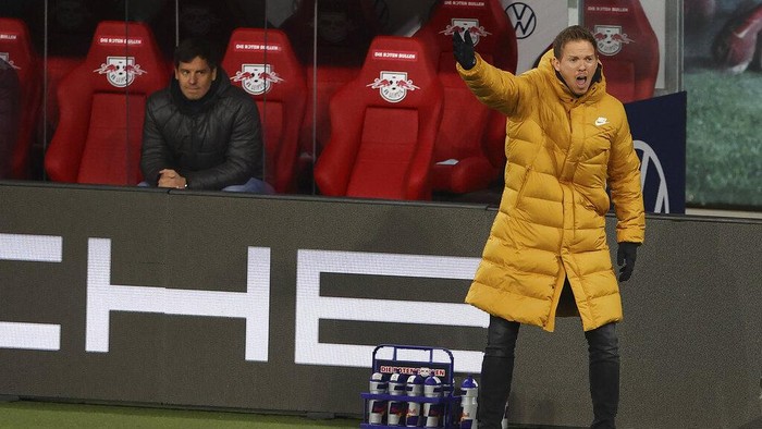 Leipzigs head coach Julian Nagelsmann reacts during the German Bundesliga soccer match between RB Leipzig and TSG 1899 Hoffenheim in Leipzig, Germany, Friday, April 16, 2021. (Jan Woitas/Pool via AP)