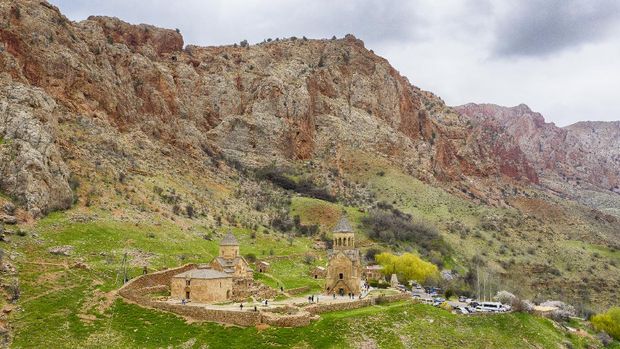 Aerial view of Noravank Monastery in the Dzor Province of Armenia. Noravank is located 122 km from Yerevan in a narrow gorge made by the Amaghu River, it goes back until the year 1205. It belongs to the national church of Armenia, the Armenian Apostolic Church.