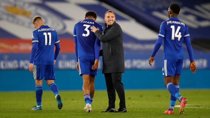 LEICESTER, ENGLAND - APRIL 26: Brendan Rogers, Manager of Leicester City celebrates on full time with Wesley Fofana of Leicester City  during the Premier League match between Leicester City and Crystal Palace at The King Power Stadium on April 26, 2021 in Leicester, England. Sporting stadiums around the UK remain under strict restrictions due to the Coronavirus Pandemic as Government social distancing laws prohibit fans inside venues resulting in games being played behind closed doors.  (Photo by Andrew Boyers - Pool/Getty Images)