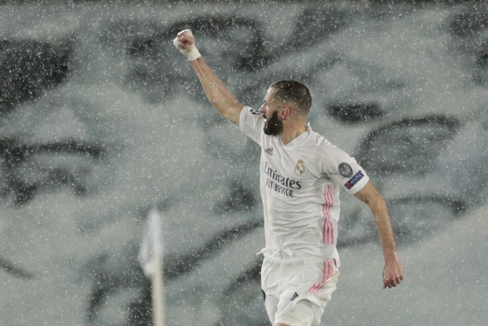 Real Madrids Karim Benzema celebrates after scoring his sides first goal during the Champions League semifinal first leg soccer match between Real Madrid and Chelsea at the Alfredo di Stefano stadium in Madrid, Spain, Tuesday, April 27, 2021. (AP Photo/Bernat Armangue)