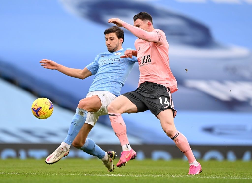 MANCHESTER, ENGLAND - FEBRUARY 27: Rúben Dias of Manchester City during the Premier League match between Manchester City and West Ham United at Etihad Stadium on February 27, 2021 in Manchester, England. Sporting stadiums around the UK remain under strict restrictions due to the Coronavirus Pandemic as Government social distancing laws prohibit fans inside venues resulting in games being played behind closed doors. (Photo by Gareth Copley/Getty Images)